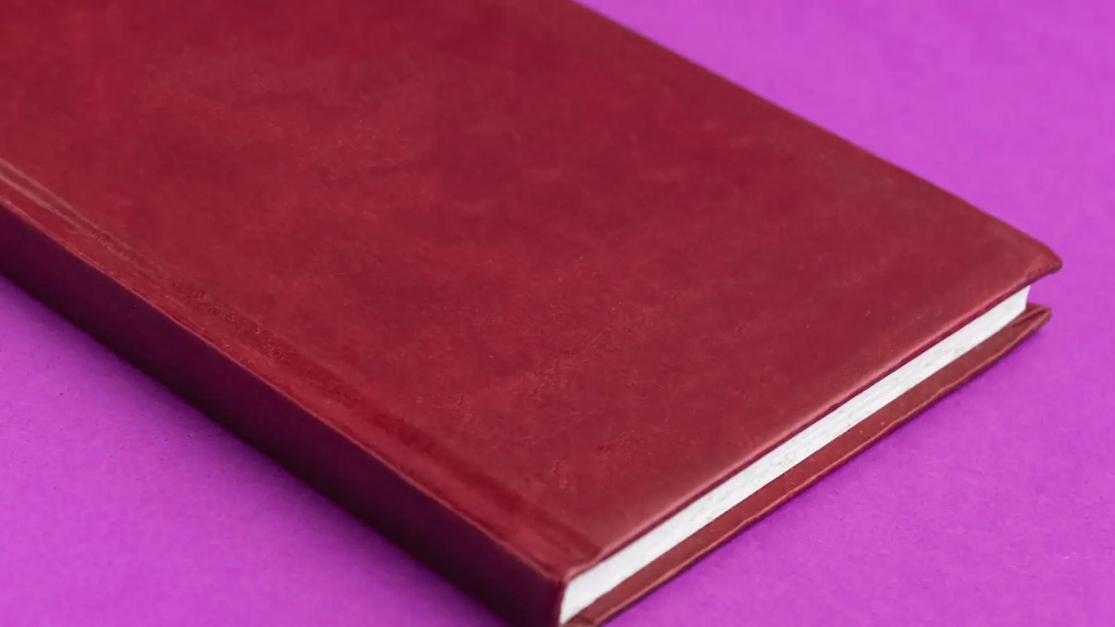 Premium hardcover book with custom binding and foil-stamped title
