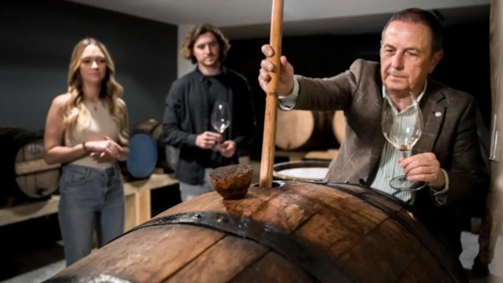 Premium oak wine barrels in a cellar for aging fine wine