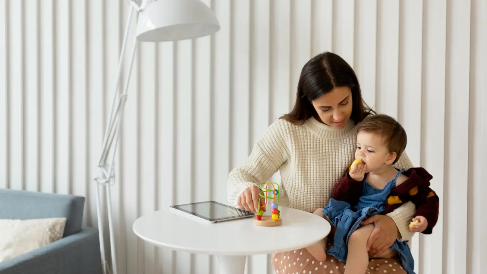 Professional nanny caring for a child in a Swiss family home