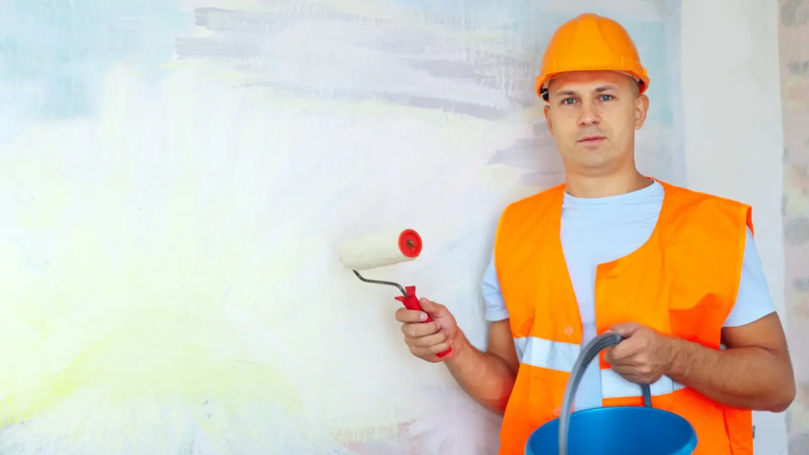 Professional painters from Triangle Pro Painting working on a residential home exterior