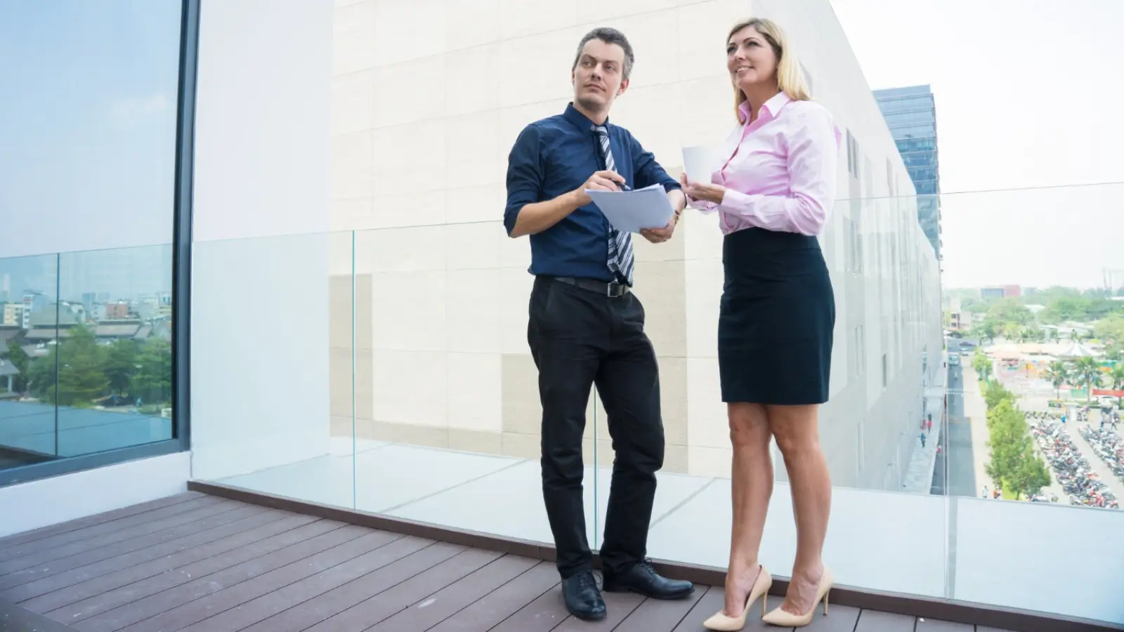 Property manager inspecting commercial building with tenant