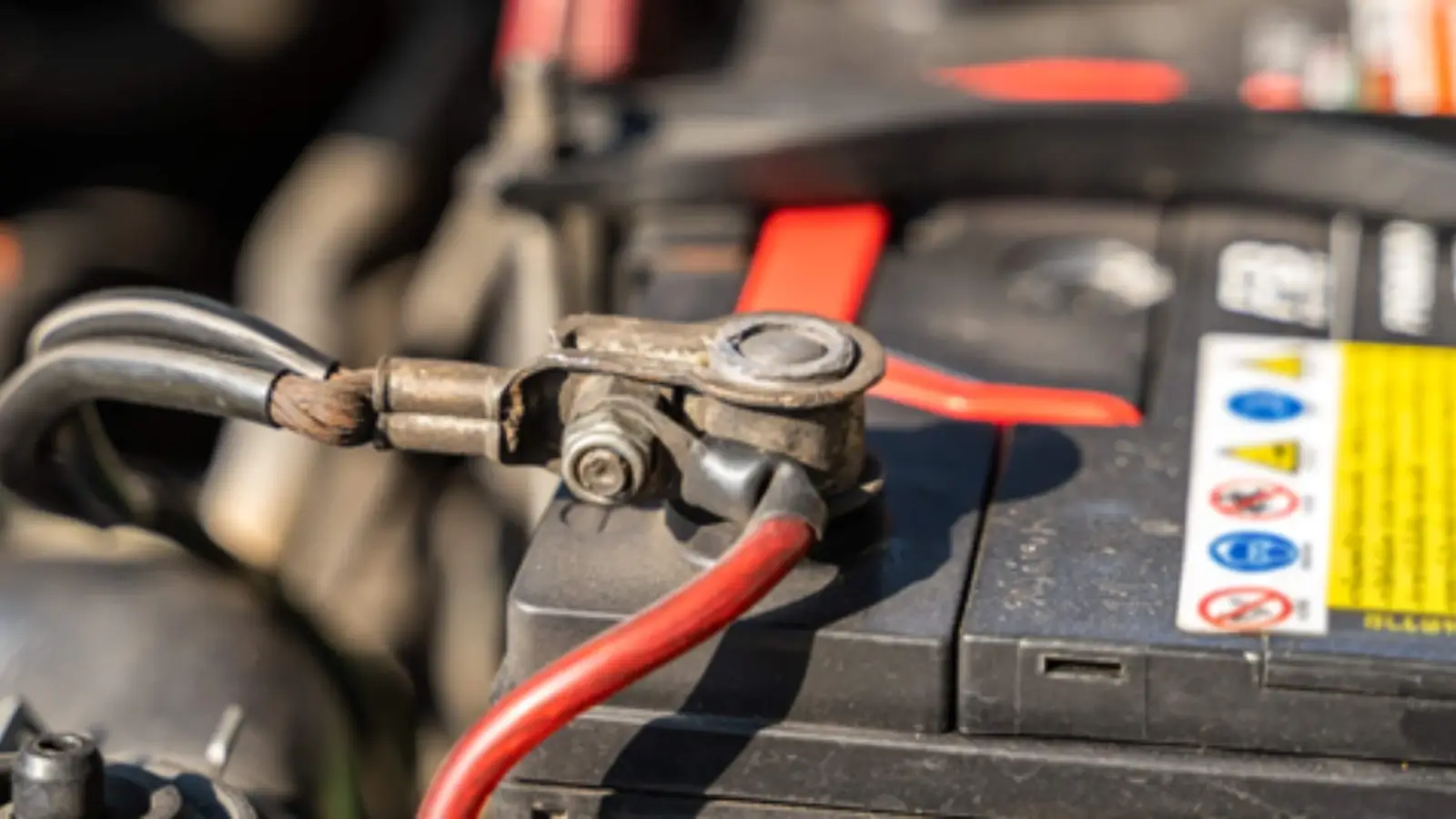 Secure battery connector terminals on an automotive industrial battery system