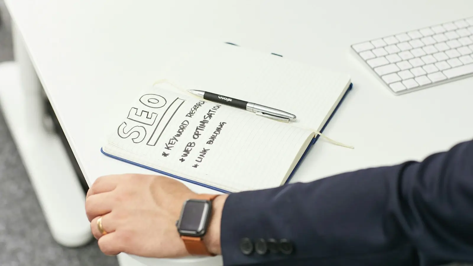 SEO expert analyzing website performance with AI-driven SEO tools on a laptop