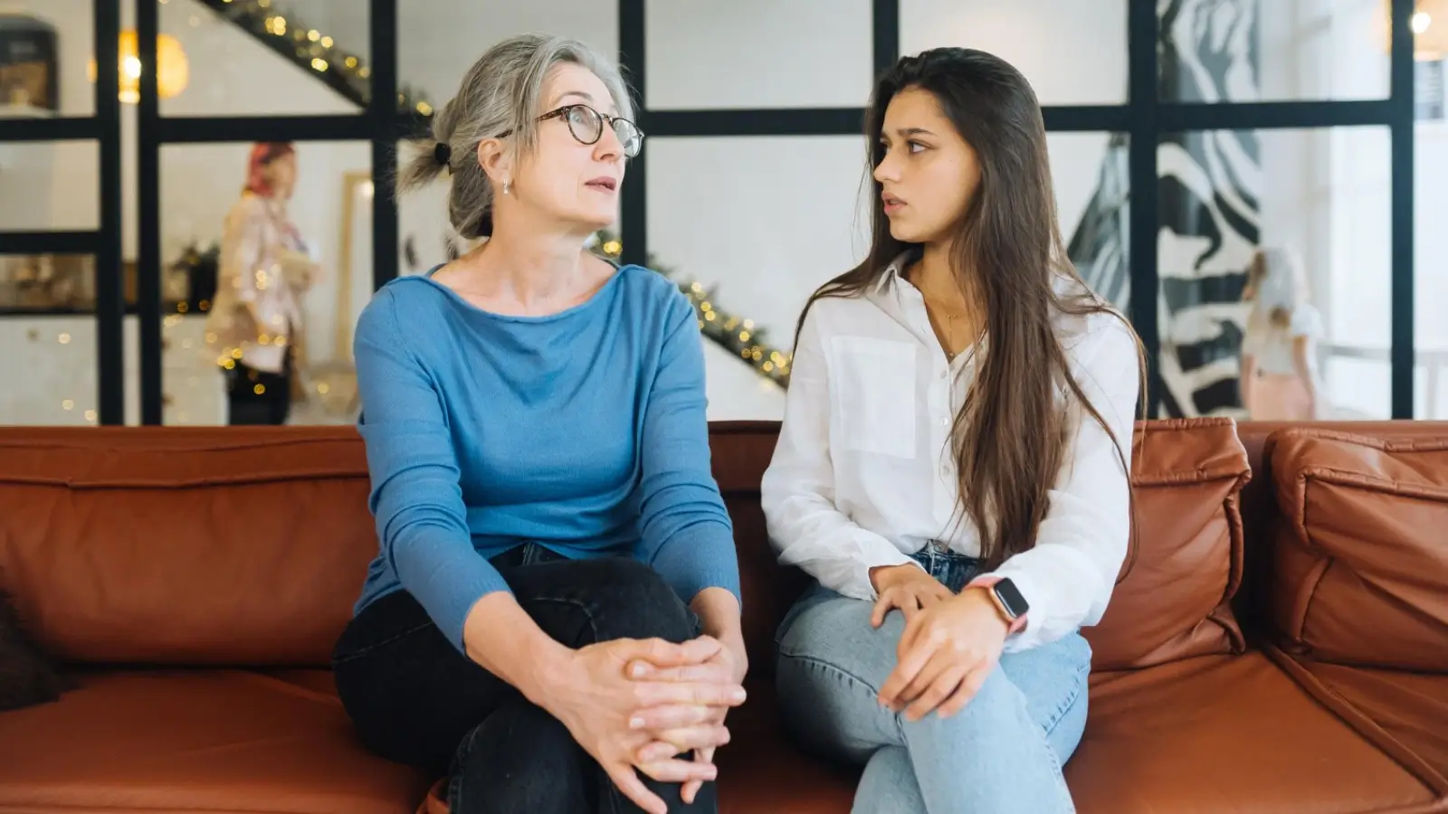 Siblings in a discussion about elder care planning for aging parents