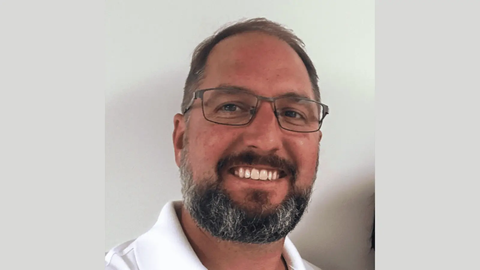 Southwest Michigan home with “For Sale” sign and renovated exterior