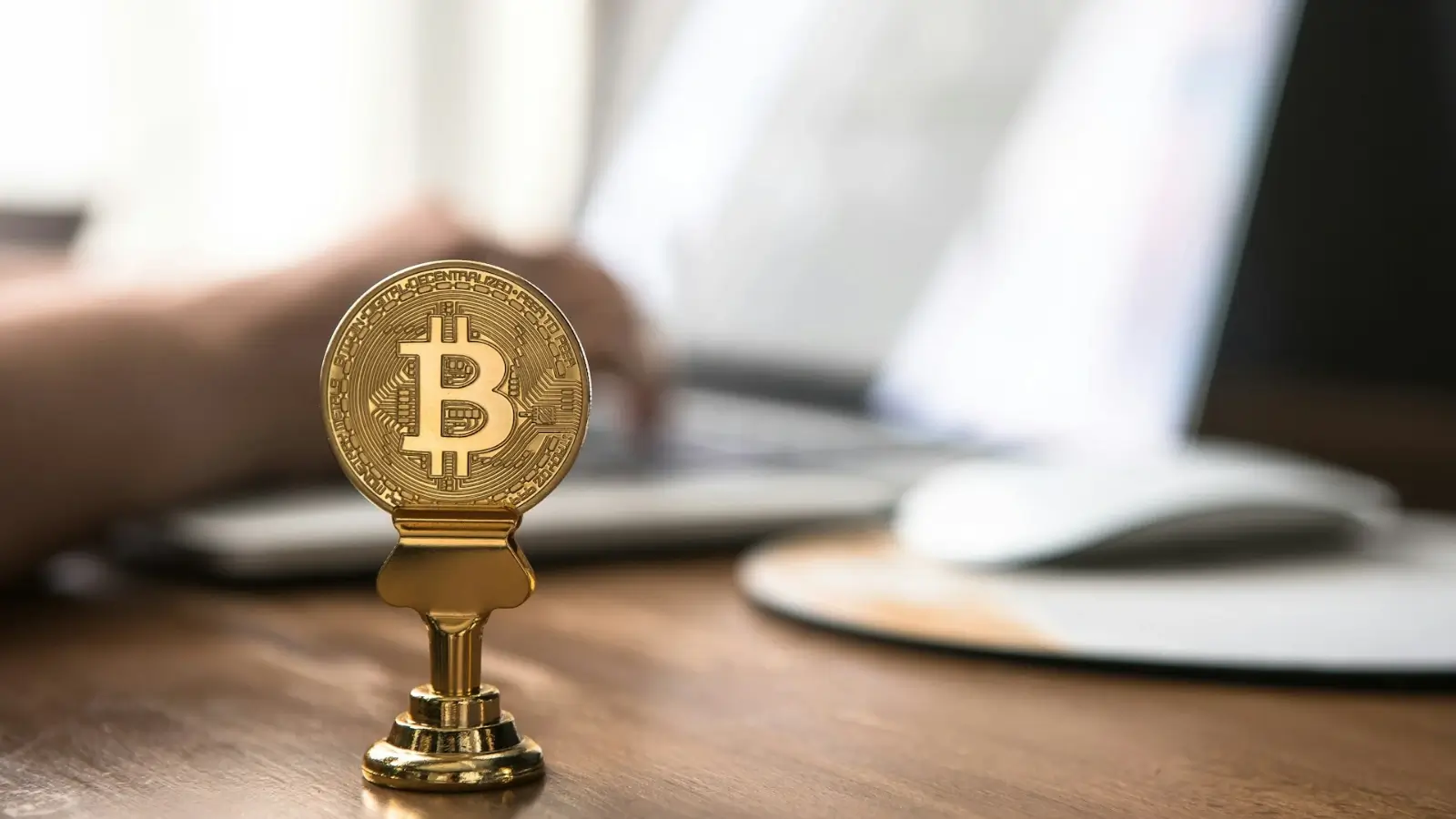 UK crypto investor reviewing digital asset tax schedules with a professional accountant