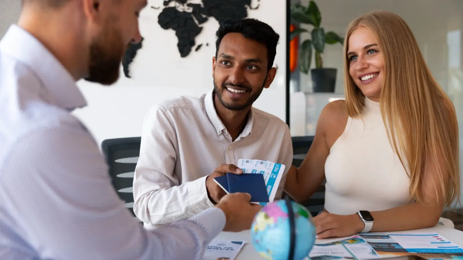 UK immigration solicitor in Manchester consulting with a couple about their spouse visa application