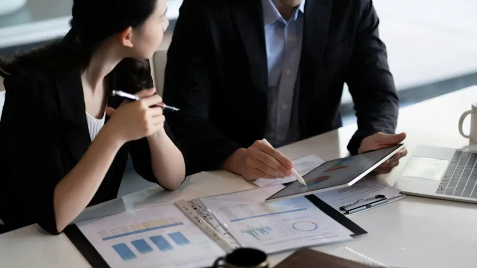 Business owner overwhelmed by trends, realizing the need for strong foundational infrastructure.