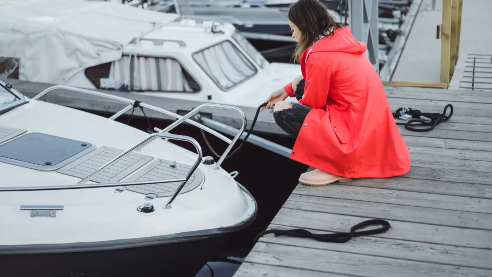 Dry docked boats safely stored for winter season with protective covers