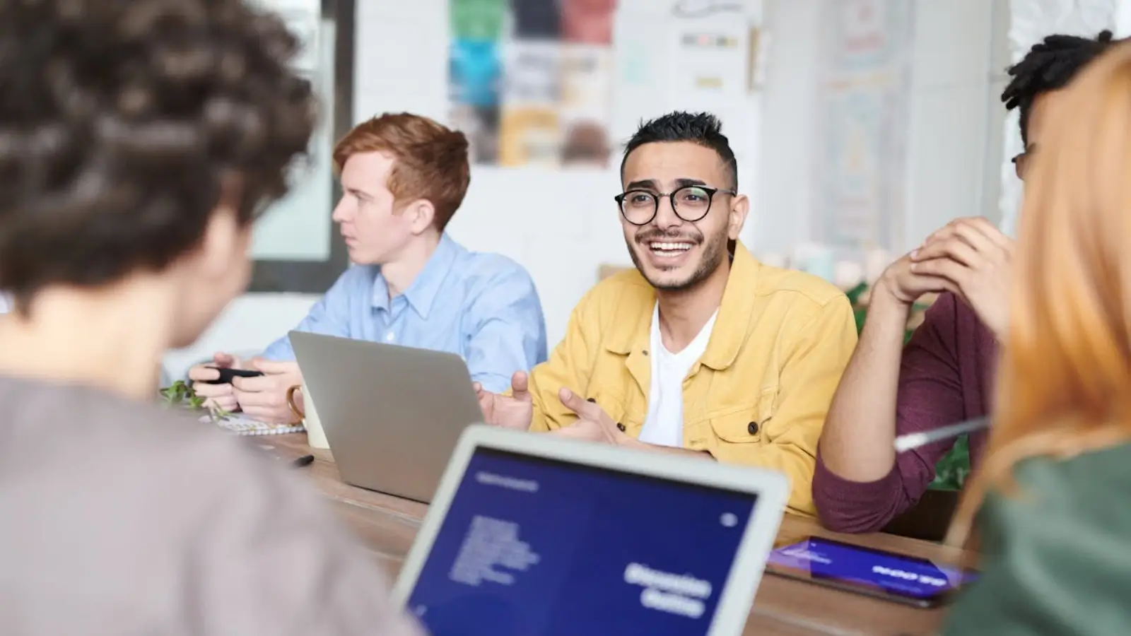 Employees attending a workplace training session for professional development