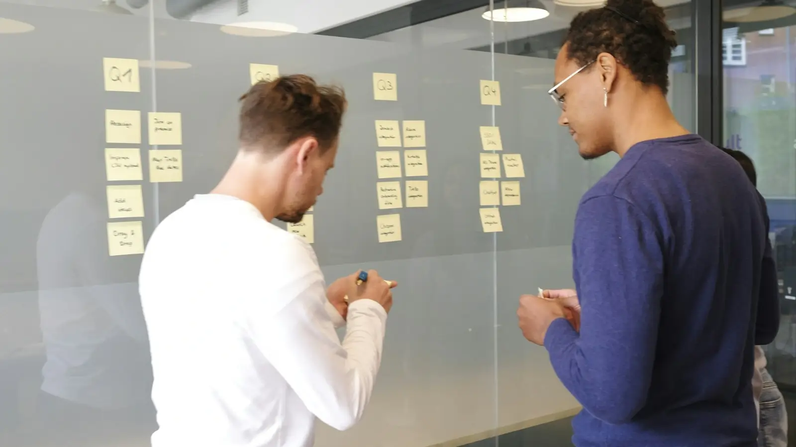 Exhausted team member at desk showing signs of workplace burnout