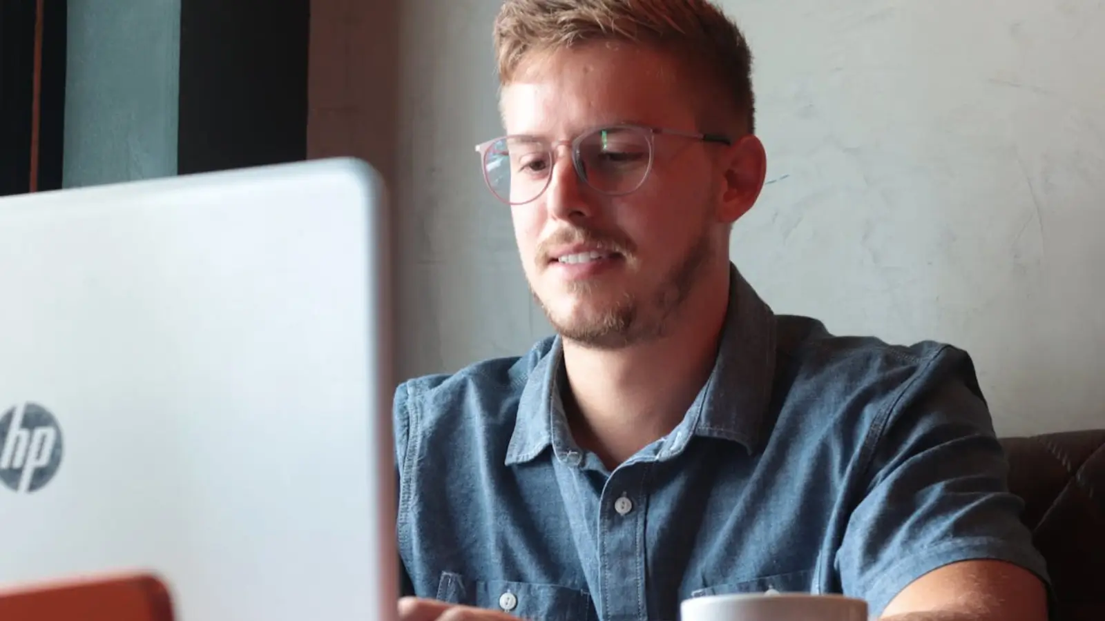 Freelancer using digital marketing tools on a laptop to manage clients and content