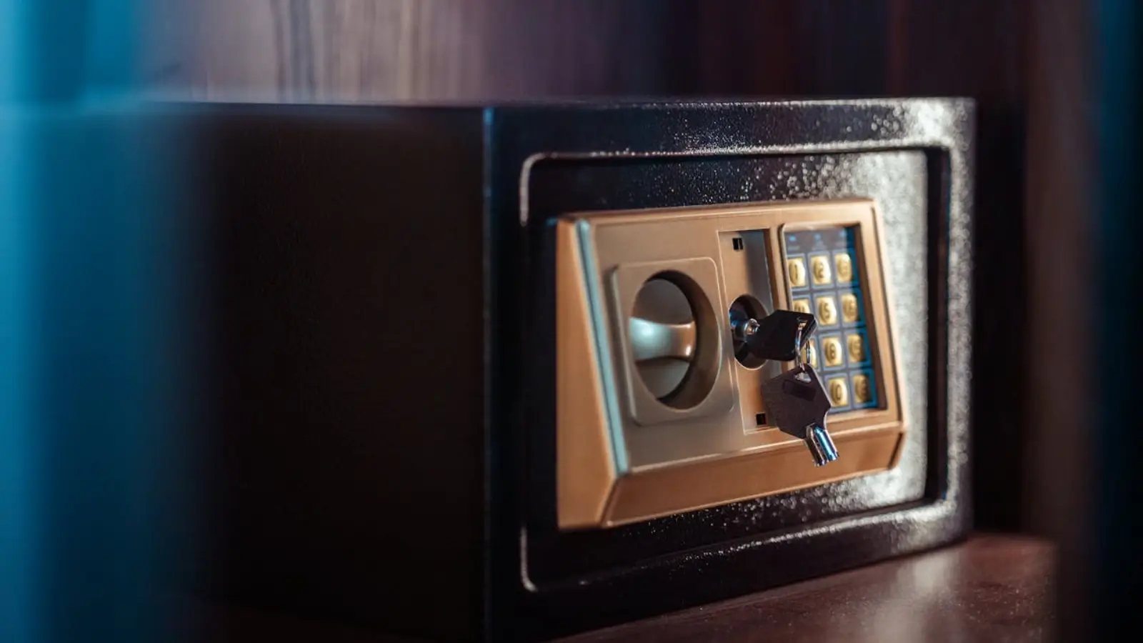 Hotel security camera overlooking well-lit parking area and lobby entrance