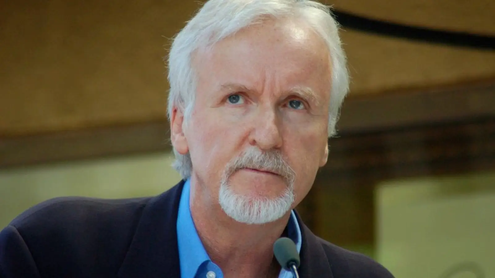 James Cameron posing at a film premiere