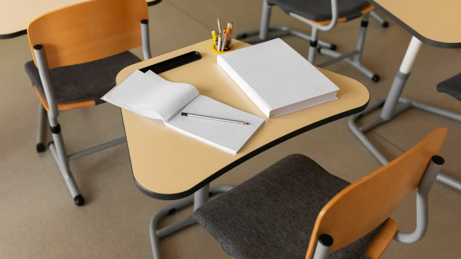 Modern classroom with ergonomic student desks, chairs, and flexible furniture layout.