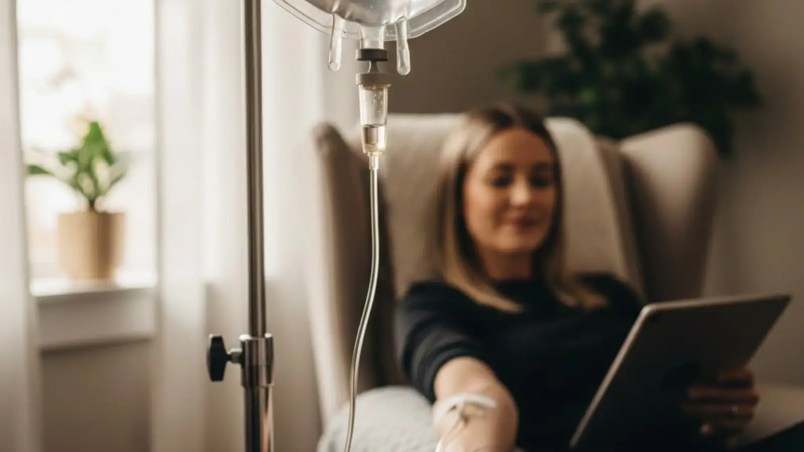 Patient receiving intravenous nutrient therapy under medical supervision