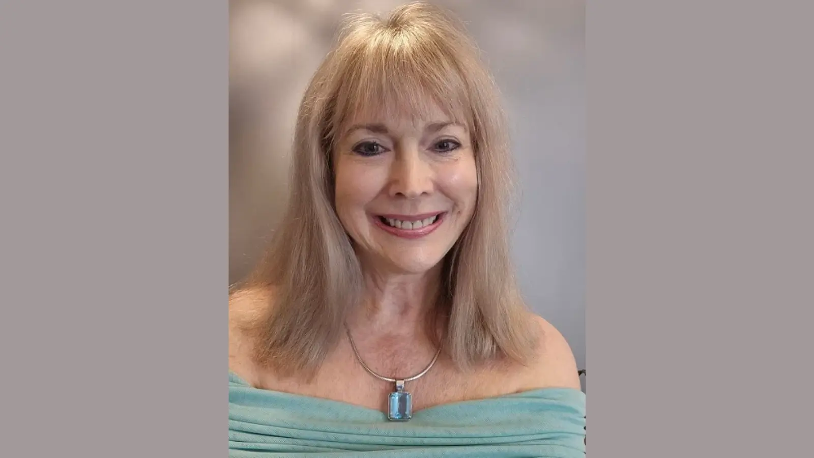 Patricia Gordon Stevens with her book Madness in Memphis