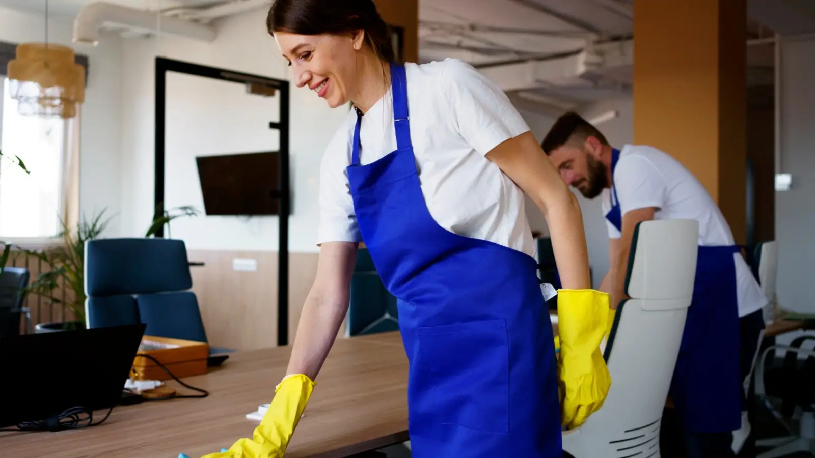 Professional cleaner maintaining spotless floors in a modern commercial space
