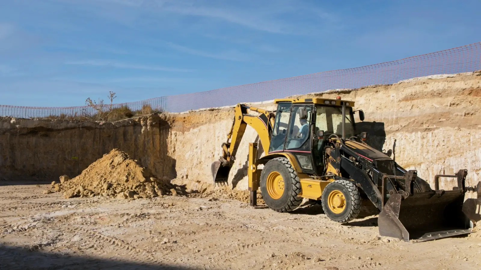 Professional excavation machinery clearing a construction site