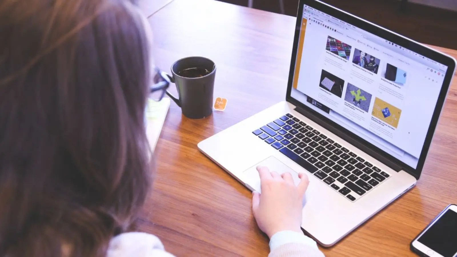 Web designer team working on UI/UX layouts in a London creative agency