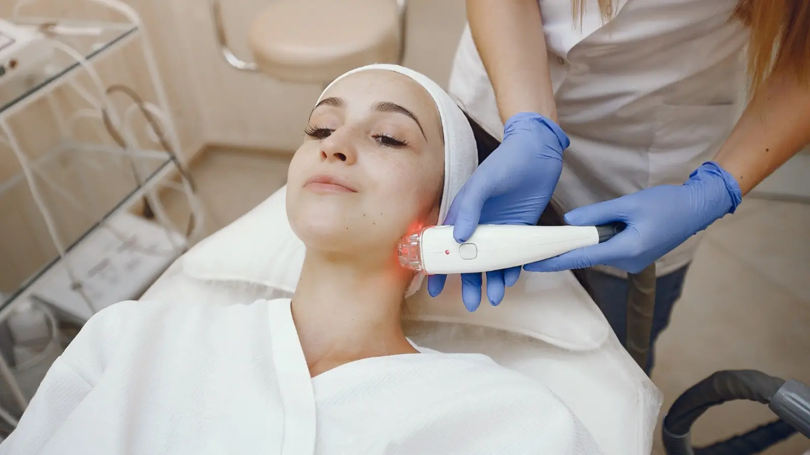 Woman receiving professional laser resurfacing treatment at a Scottsdale med spa