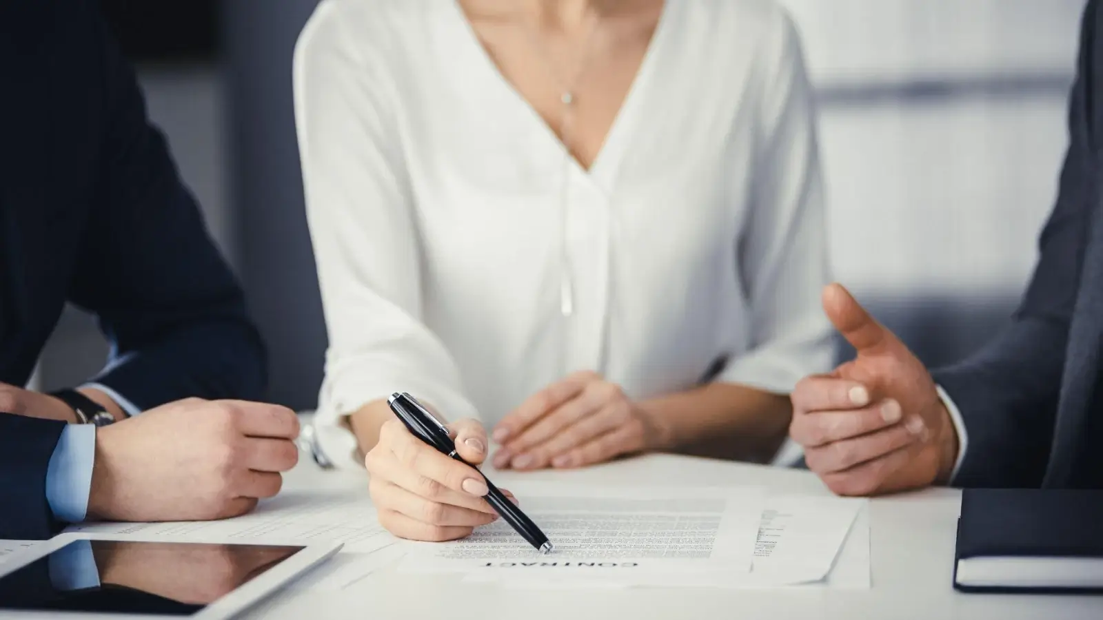 How an Idaho Injury Lawyer Uses Evidence to Prove Your Case Idaho personal injury lawyer reviewing case files and evidence with a client.