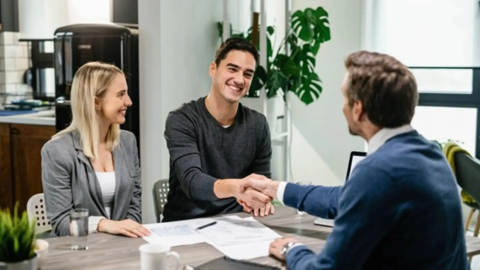 Understanding Eligibility for Small Business Loans in Australia Australian small business owner reviewing financial documents for loan application