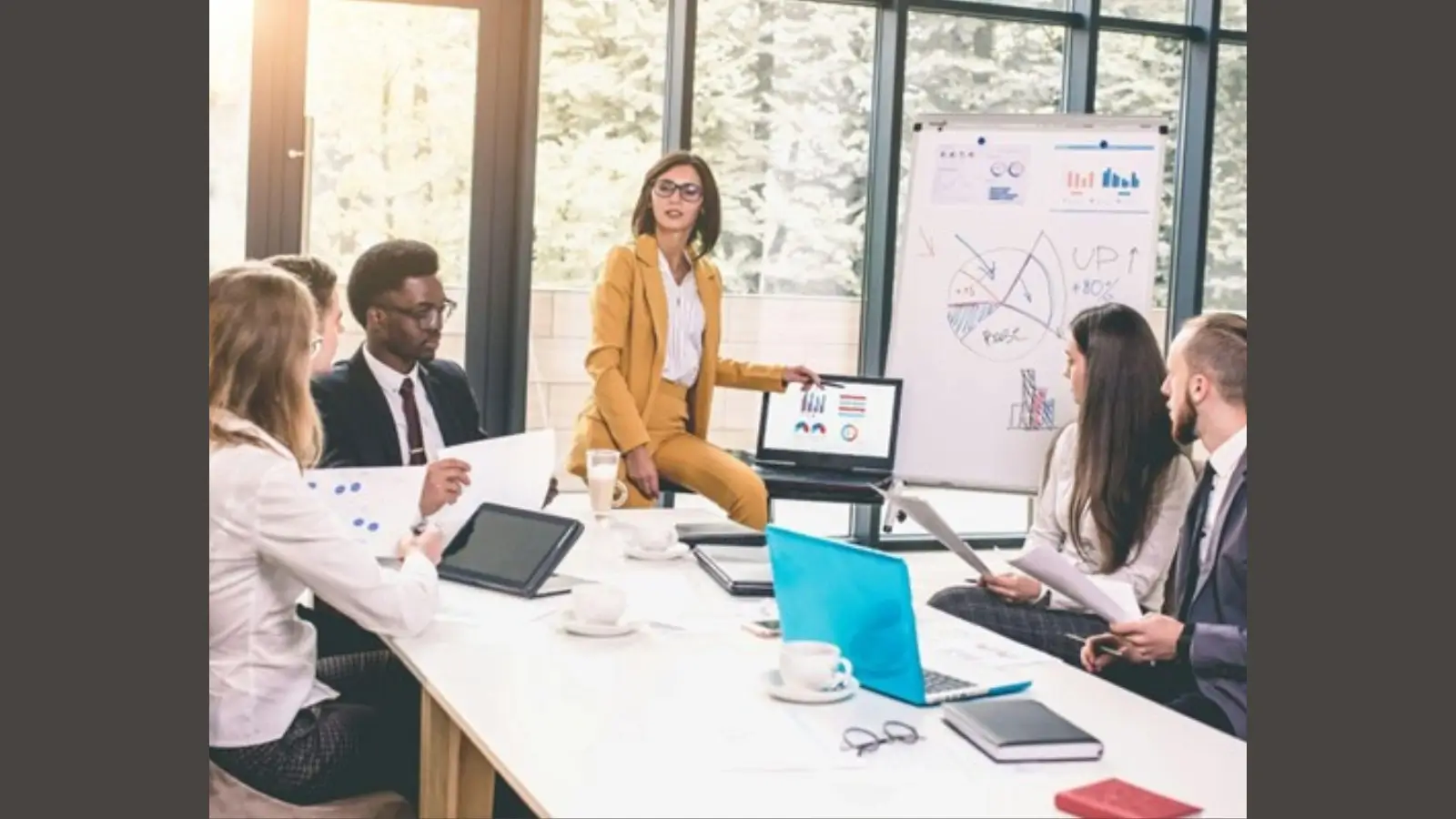 Ahmed Akbar Sobhan Explains Adaptive Leadership in the Age of AI and Automation Business leader guiding a diverse team through digital transformation with confidence