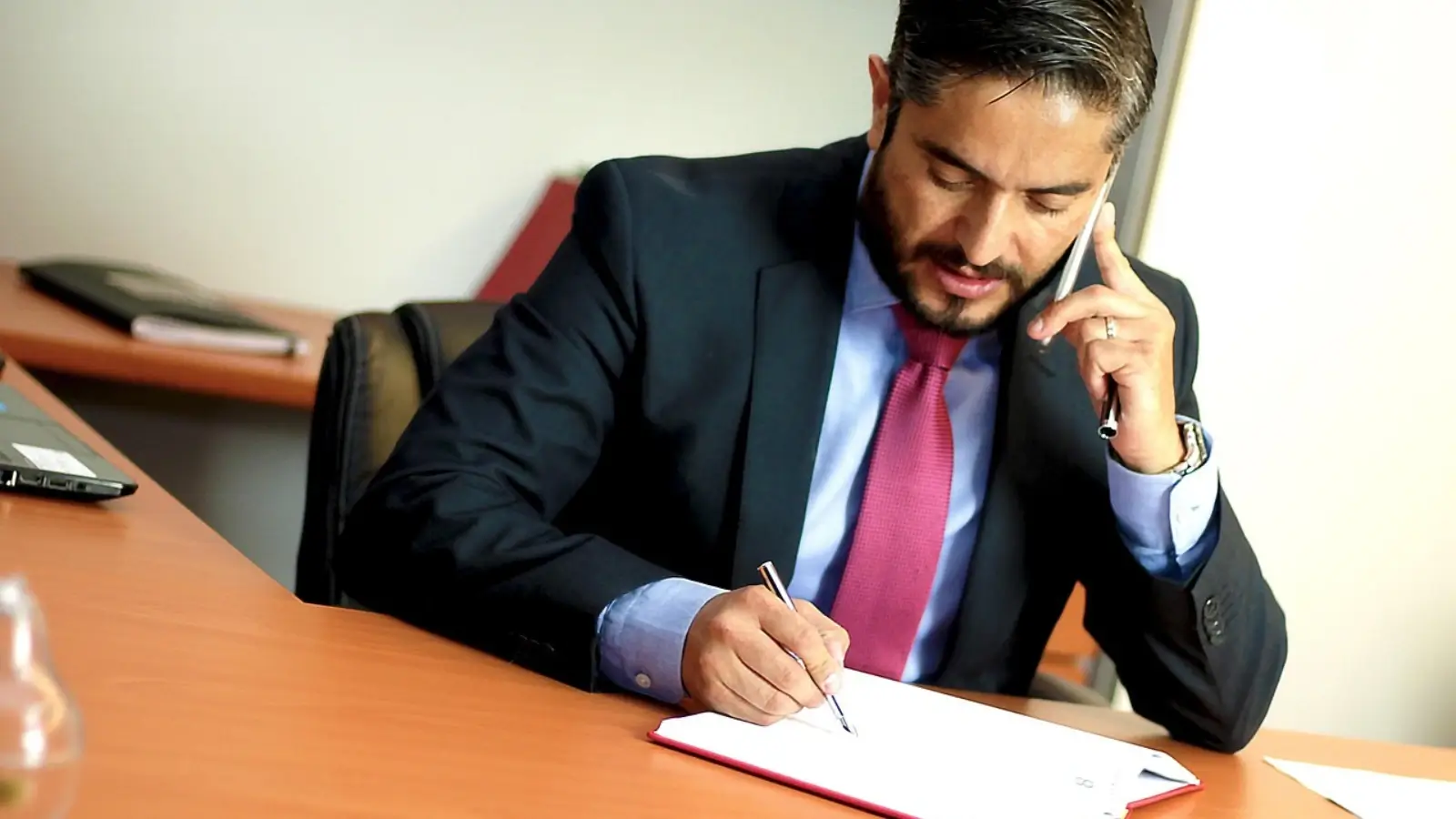 Injured person consulting with a personal injury lawyer in a San Diego office