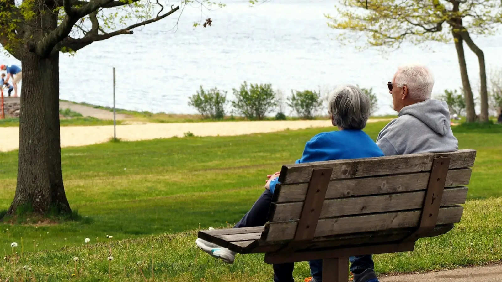 Retired couple enjoying nature and discussing future plans