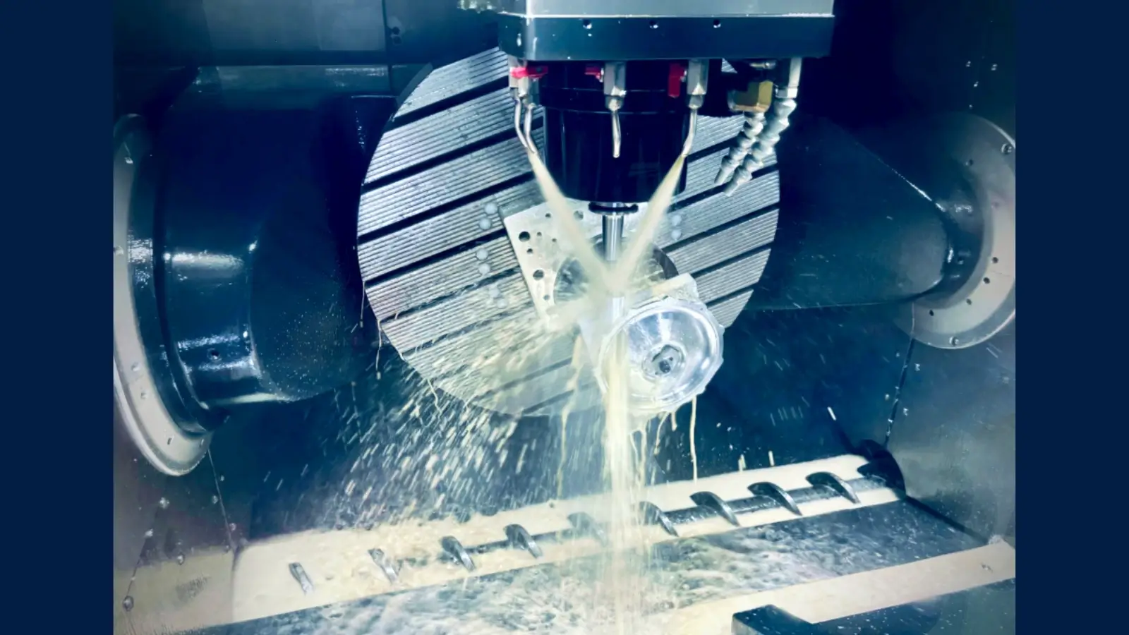Startup engineer examining CNC prototype part in workshop