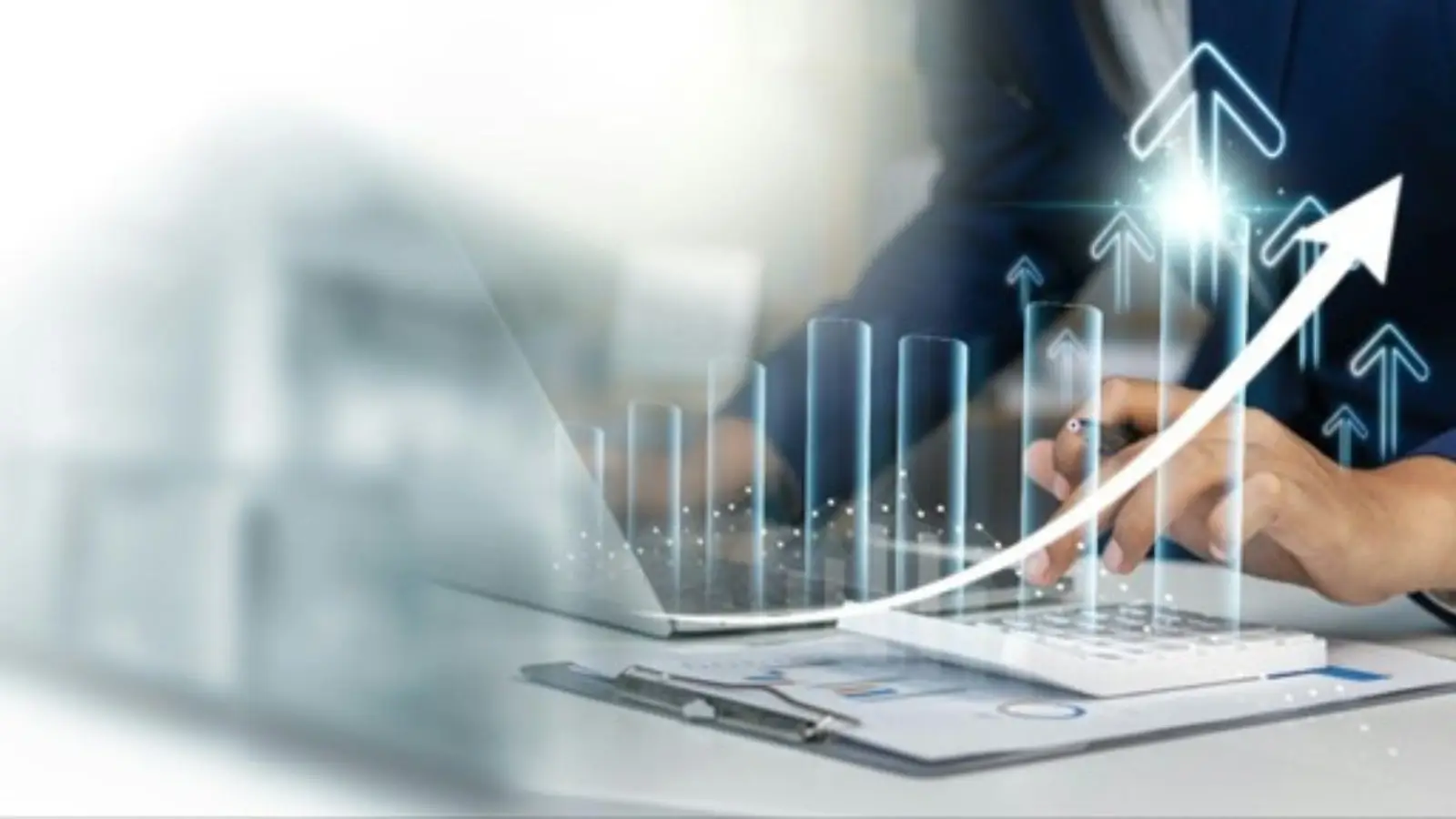 Scaling Your Business? Scale Your Tech Team the Smart Way Tech team collaborating on scaling strategy with laptops and flowcharts