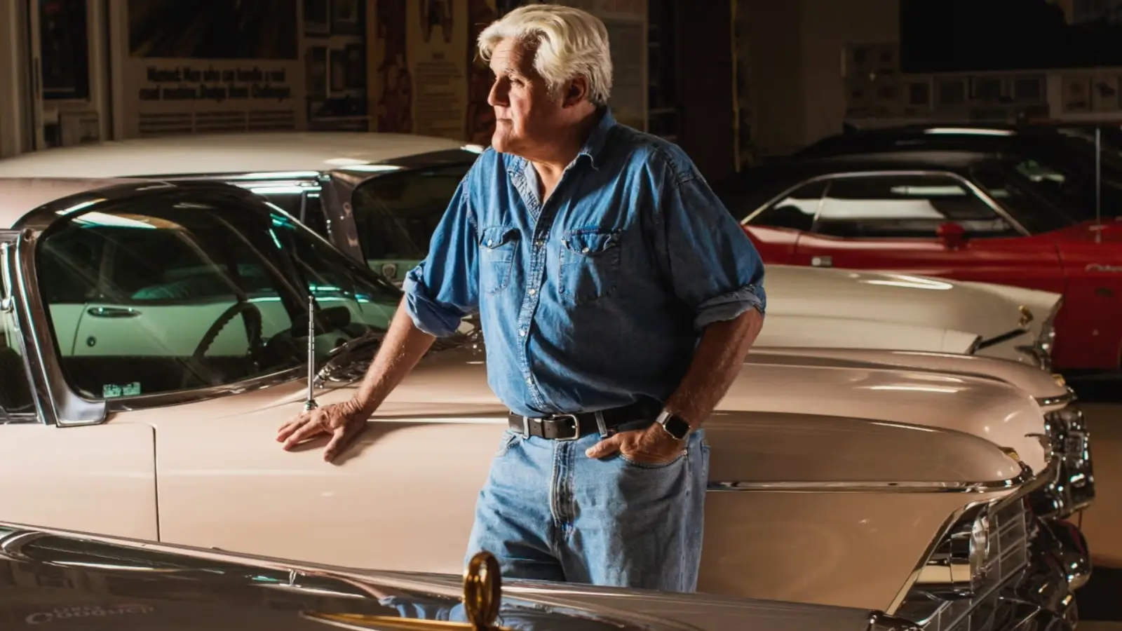 Jay Leno Net Worth: How the Comedy Kingpin Stacked Up $450 Million Jay Leno standing in his garage with classic cars from his multimillion-dollar collection