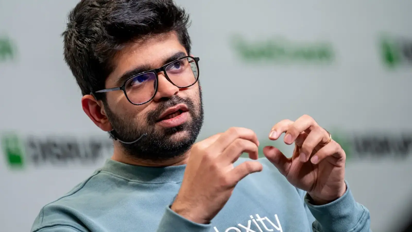 Perplexity CEO Aravind Srinivas Joins Billionaire Founder Ranks with $27 Million Net Worth Aravind Srinivas, CEO of Perplexity AI, speaking at a tech event