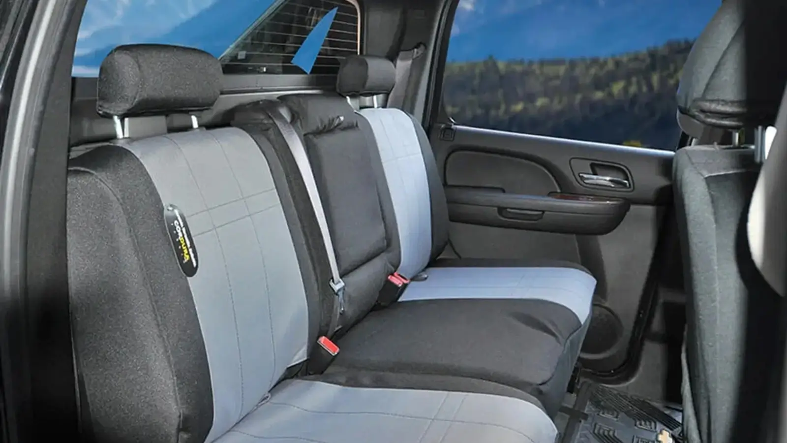 Heavy-duty custom-fit seat covers installed in a rugged pickup truck interior