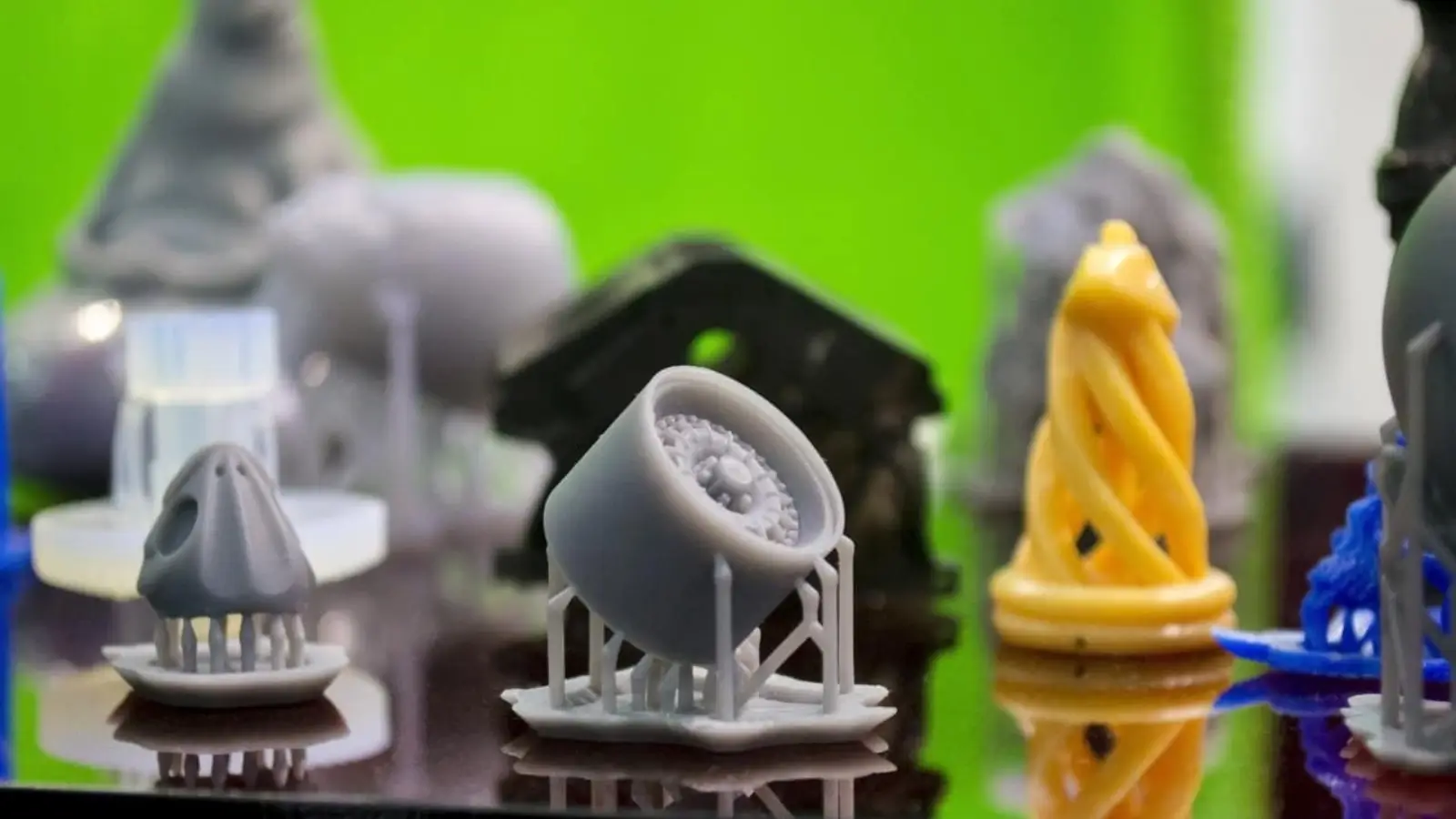 High-precision resin 3D printed custom part on a workbench