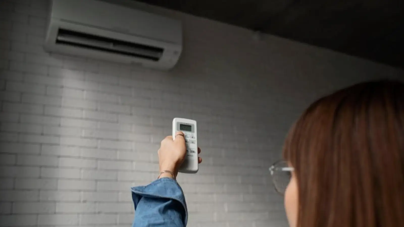Maximize Your Savings: Top Rebates For Efficient Air Conditioners Homeowner applying for air conditioning rebate with energy-efficient HVAC system