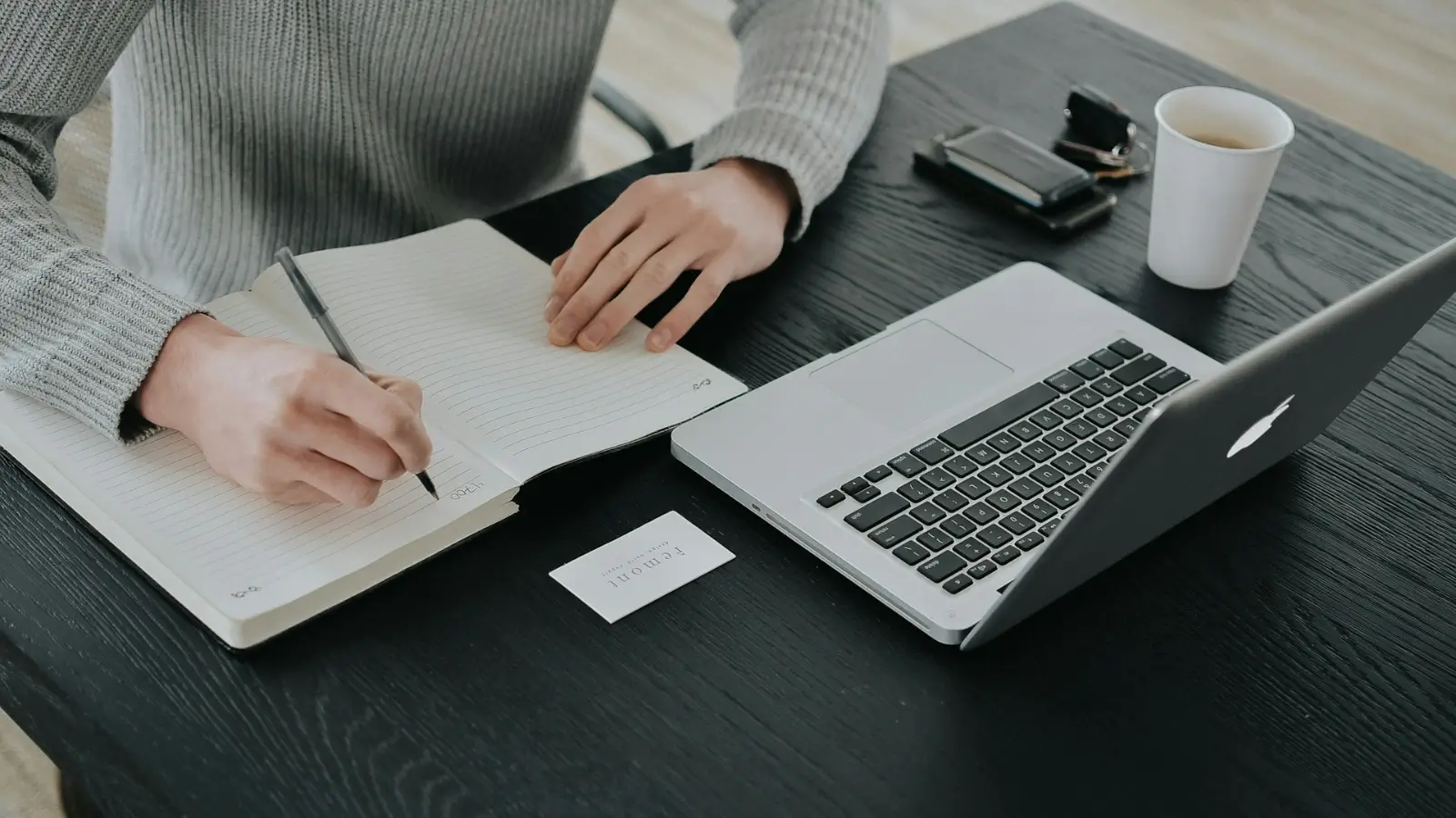 Smart Financial Moves for Tech Workers During Economic Uncertainty Stressed tech worker reviewing finances during layoffs in 2025