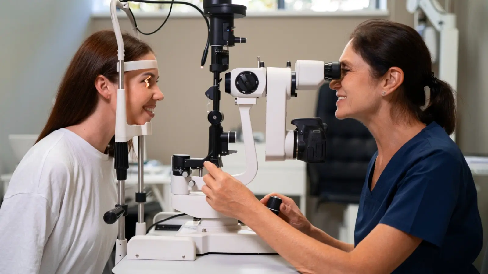 Optometrist reviewing patient records in a modern eye care clinic