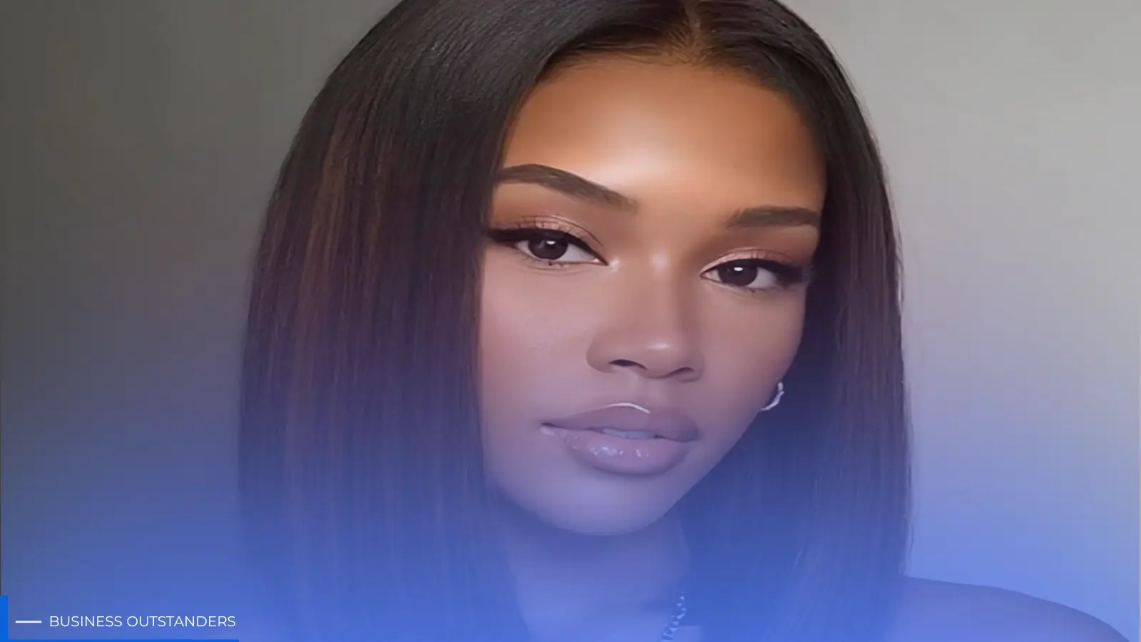Woman adjusting a glueless drawstring wig for a natural hairstyle