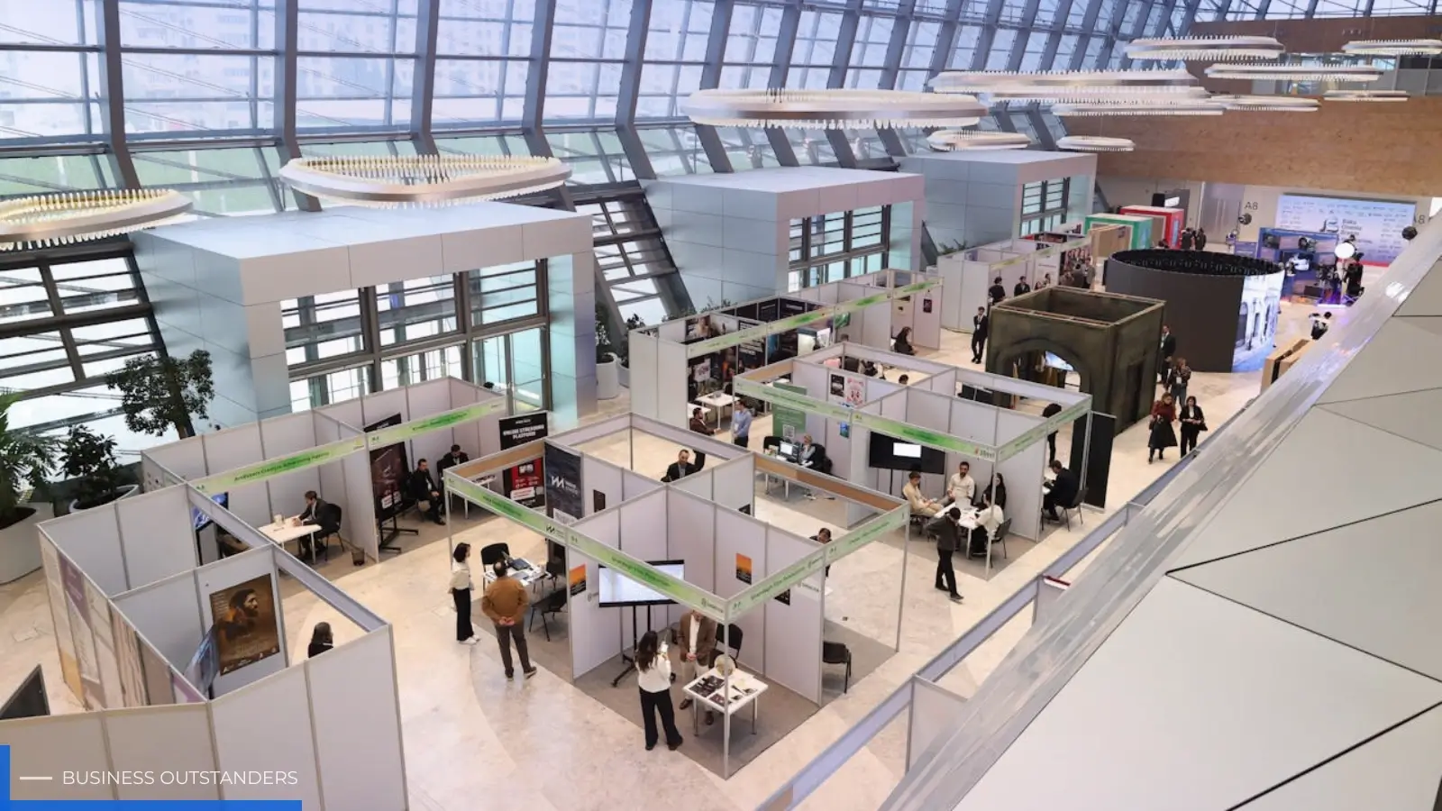 Trade show booth display with bold graphics and clear messaging on a busy convention floor