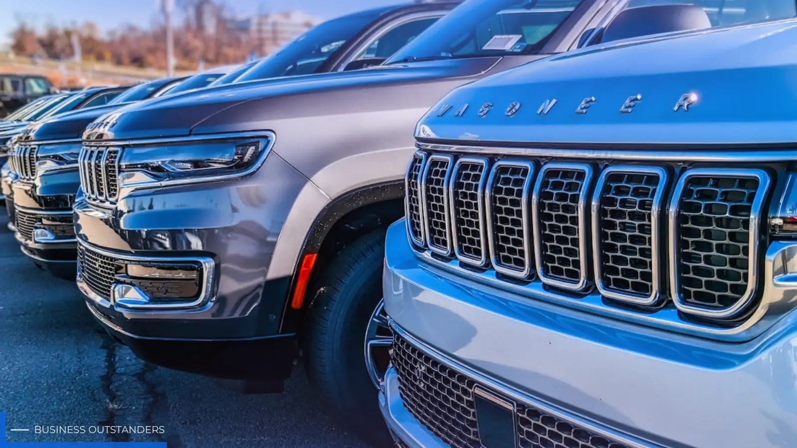 A row of well-maintained used cars available for sale at a dealership lot
