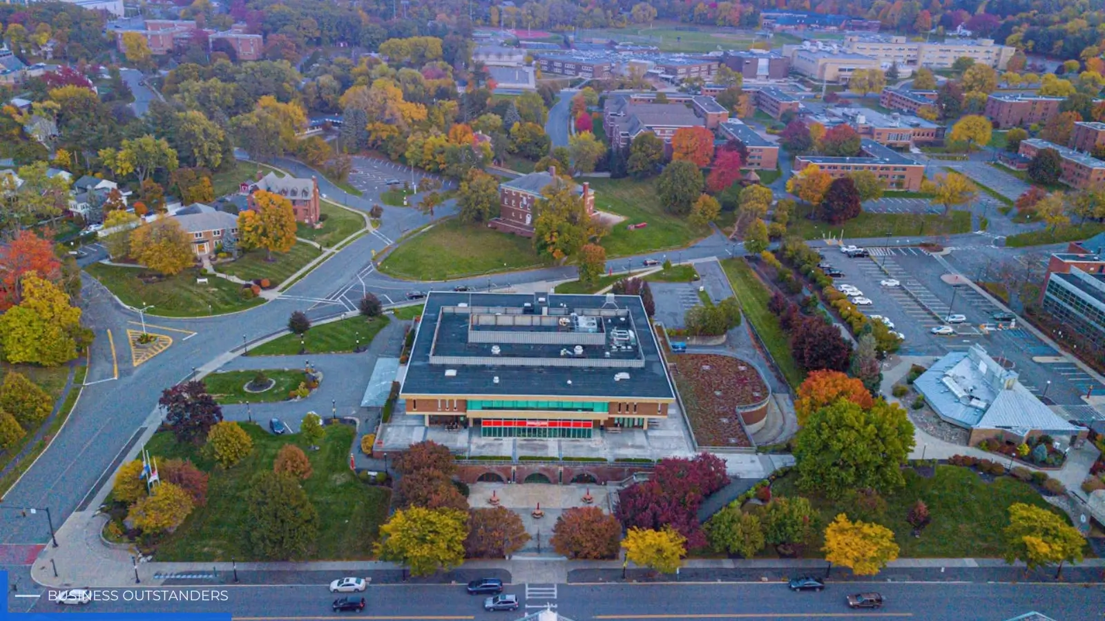 Aerial view of a regional Australian university town with residential properties and campus buildings