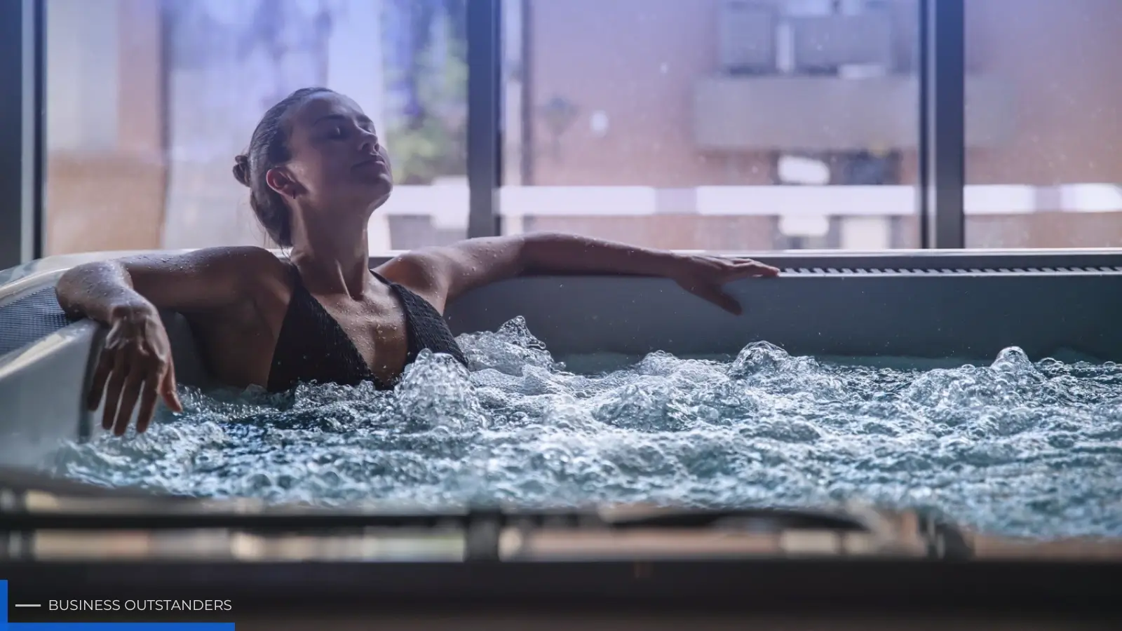 Athlete immersed in a professional cold plunge pod for controlled cold water therapy and recovery