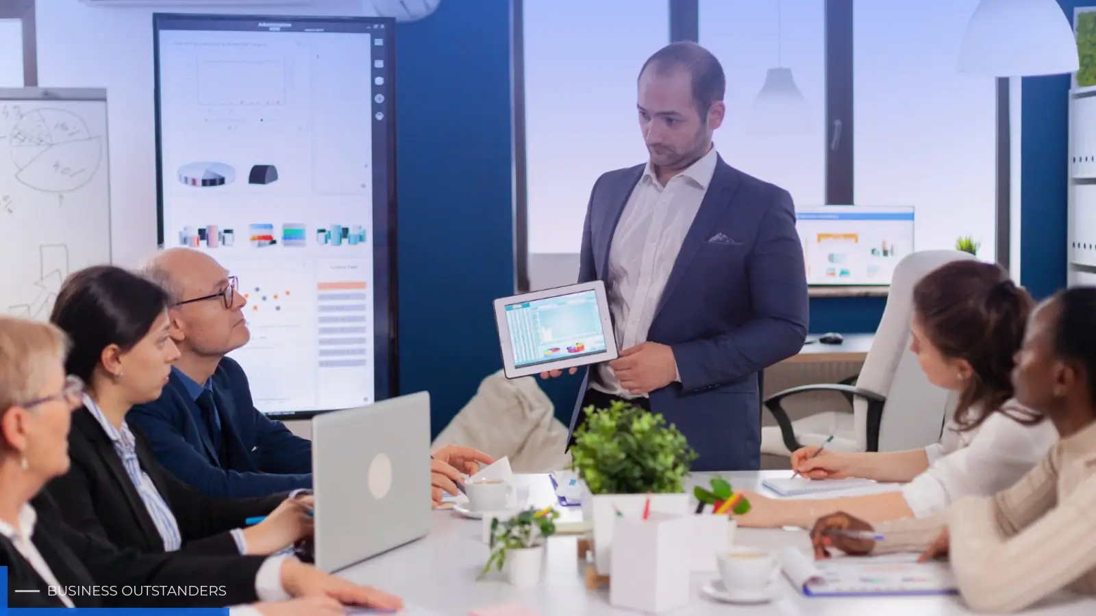 CEO making strategic business decisions in a boardroom with data charts and leadership team