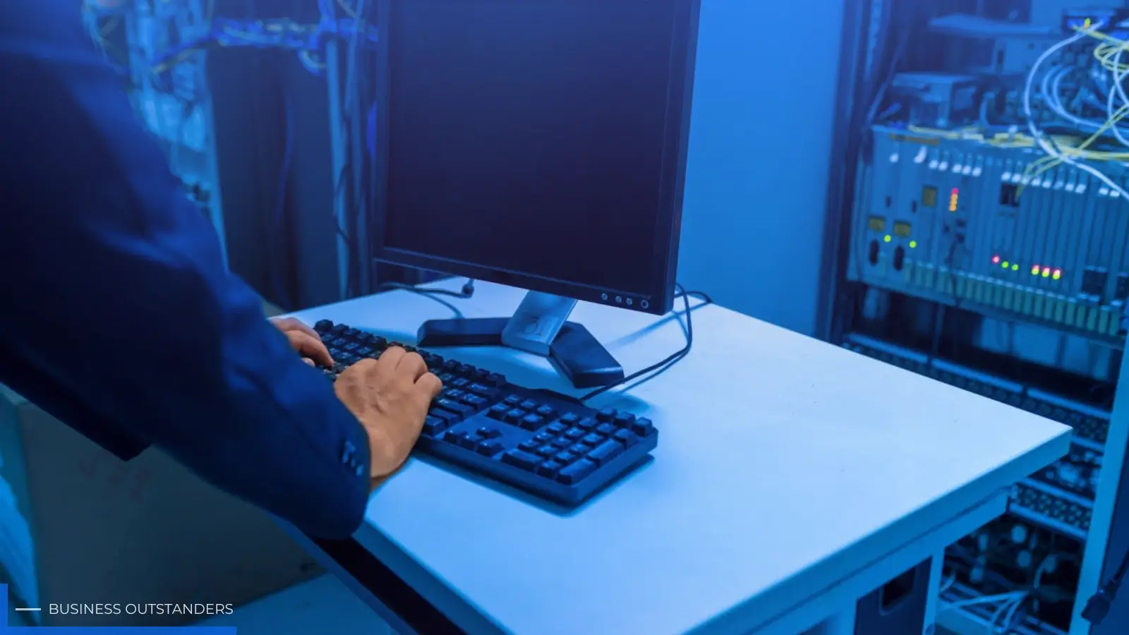 IT professional conducting a cybersecurity and infrastructure audit on business network systems