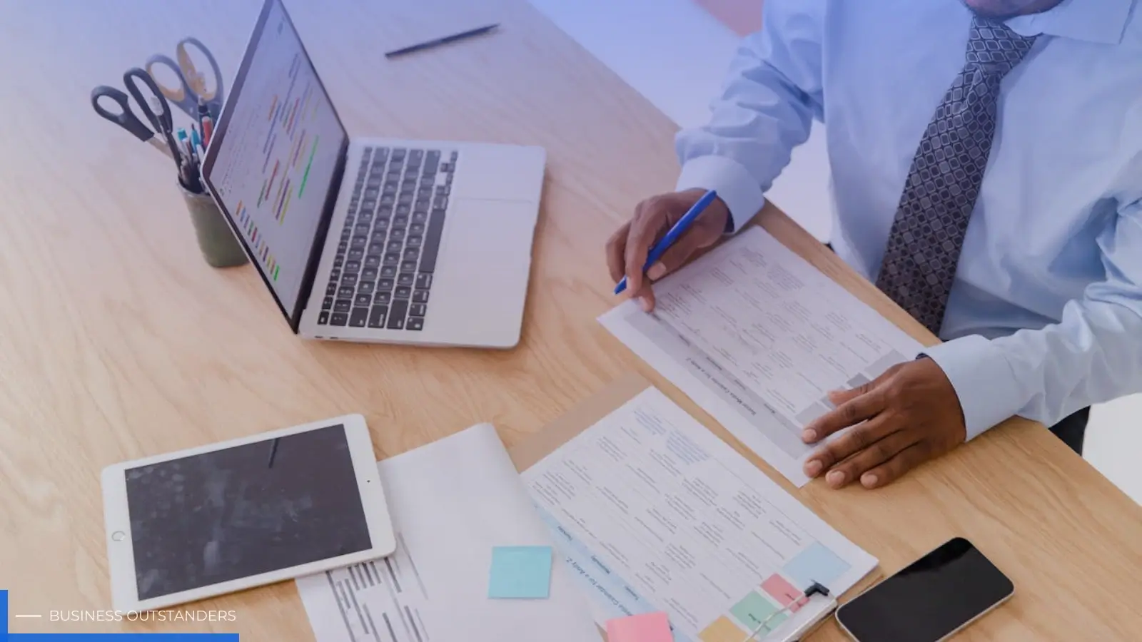 Operations manager reviewing IT budget dashboard highlighting hidden technology costs and technical debt