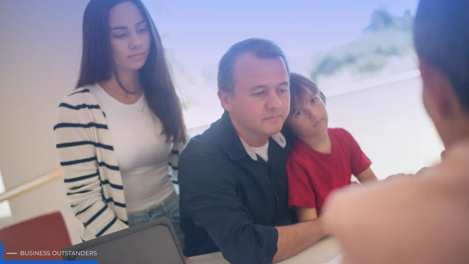 Parents reviewing North Carolina child support calculator worksheet with attorney