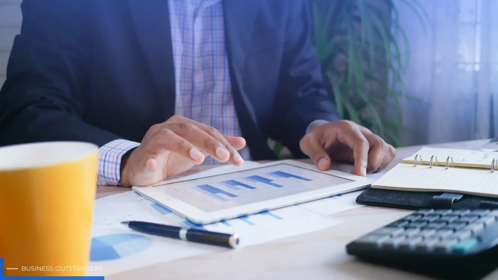 Service business owner reviewing revenue attribution dashboard comparing lead costs to actual signed client value