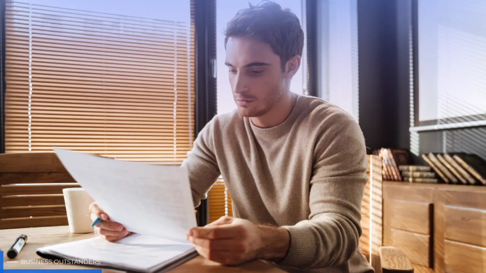 Small business owner reviewing IRS relief program documents for tax credit eligibility